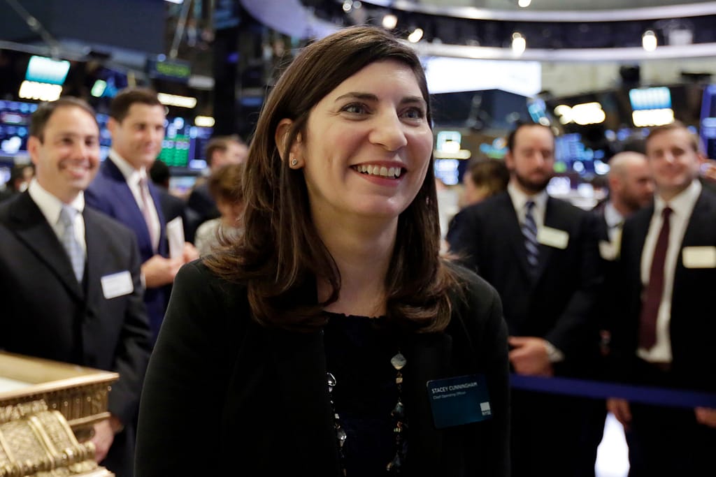 Photo by Richard Drew/AP/REX/Shutterstock (9689386b) Stacey Cunningham, the current New York Stock Exchange COO, who will become the exchange's 67th president, visits the floor of the NYSE, . Cunningham will become the first female leader in the history of the 226-year-old exchange NYSE First Female Leader, New York, USA - 22 May 2018